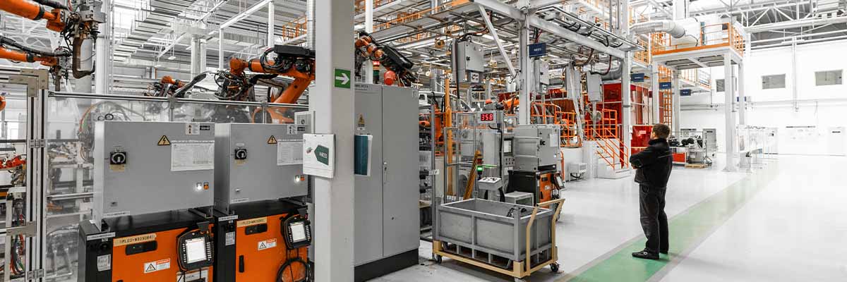Automotive production line manufacturing EV batteries.