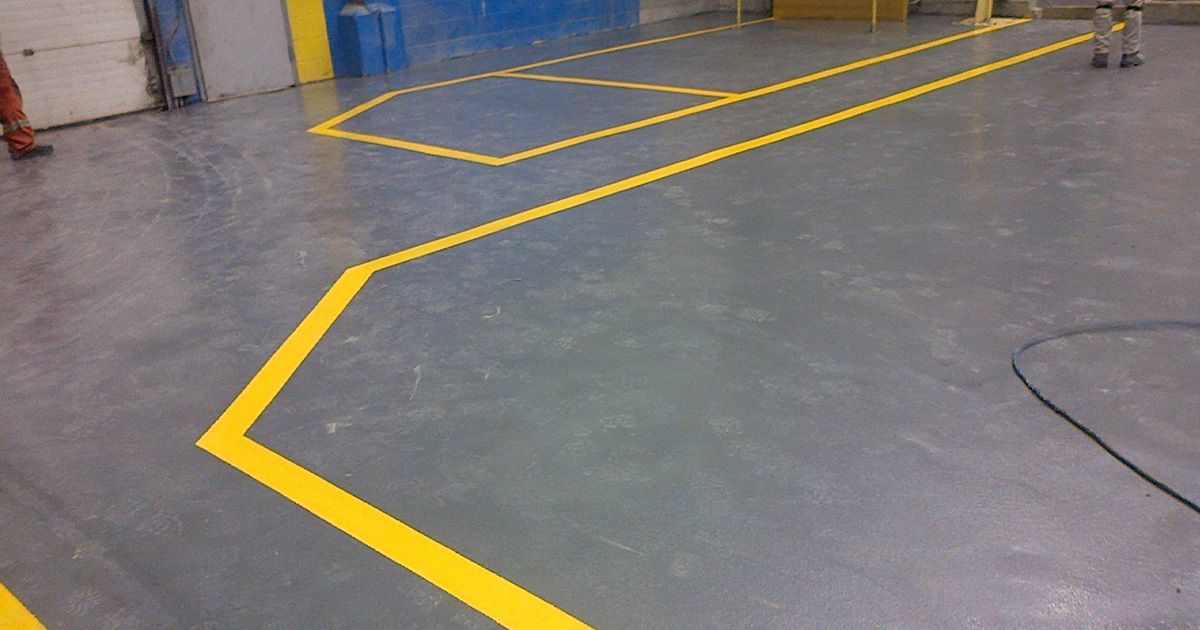 Finished high-traffic concrete floor with epoxy resurfacing by BNE.