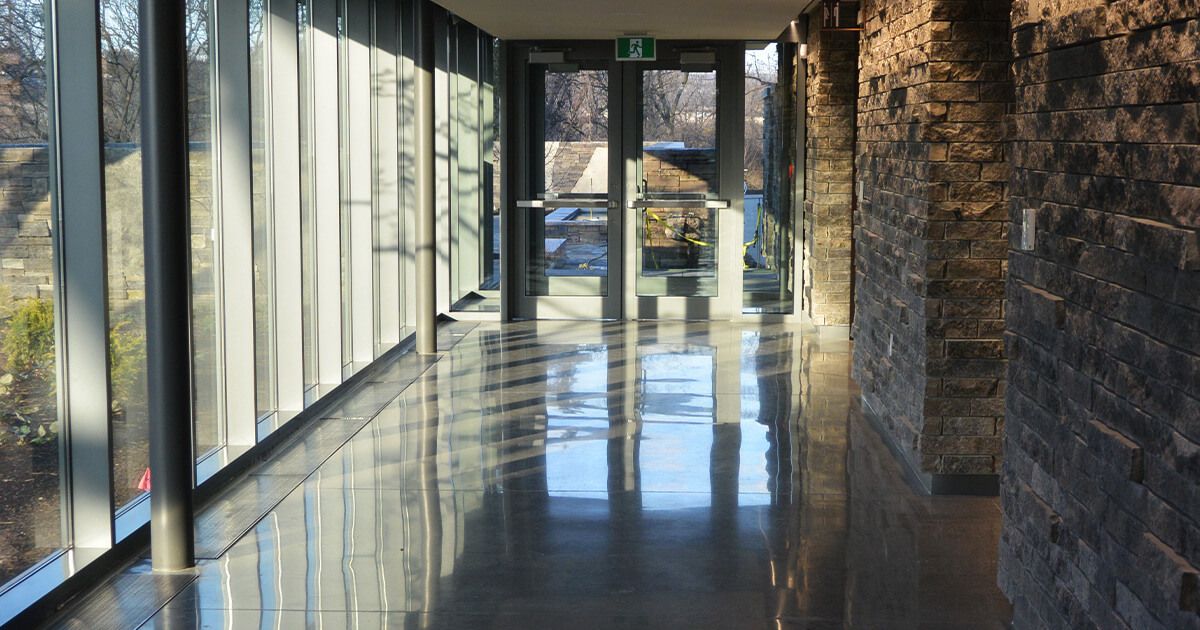 Food manufacturing business hallway; polyurethane cement flooring.